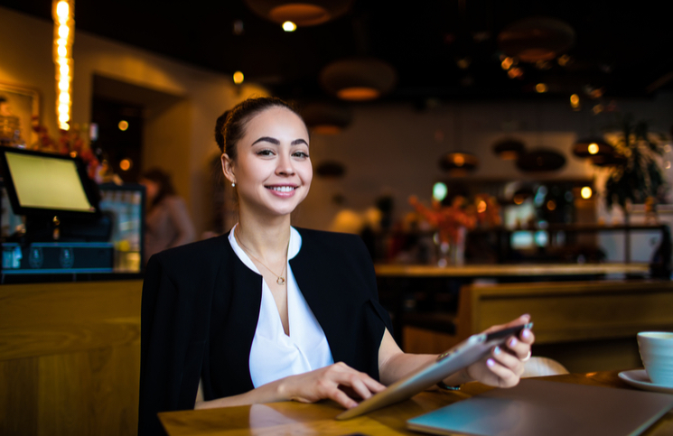 Restaurant owner managing her business social media Restaurant owner managing her business social media
