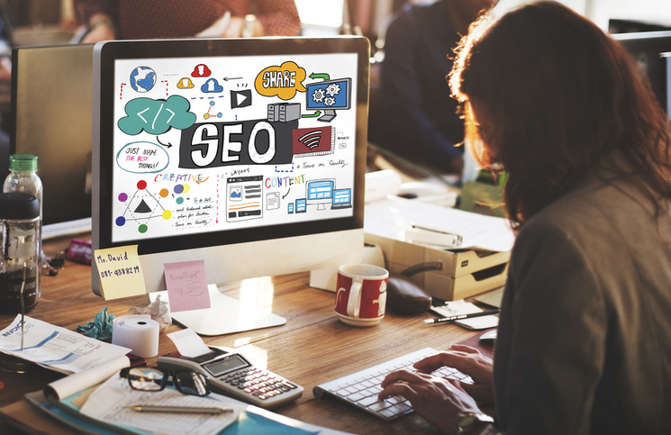 Woman working on SEO and Google Ads Woman working on SEO and Google Ads