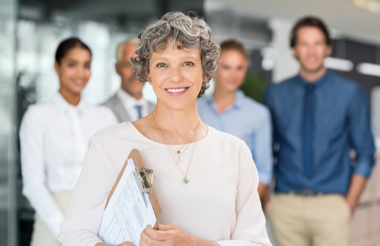 Woman entrepreneur with her team